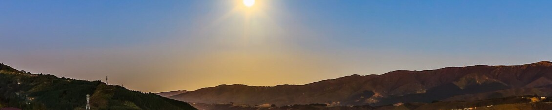 The sun setting in on Hutt hills